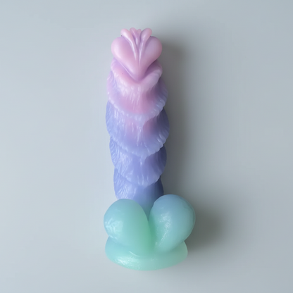 Pastel-colored silicone toy on a light gray background