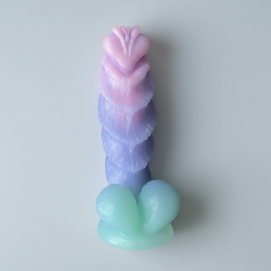 Pastel-colored silicone toy on a light gray background