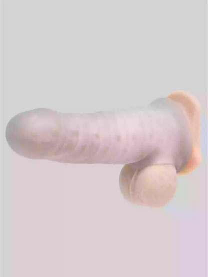 Pink and beige toy on a light gray background