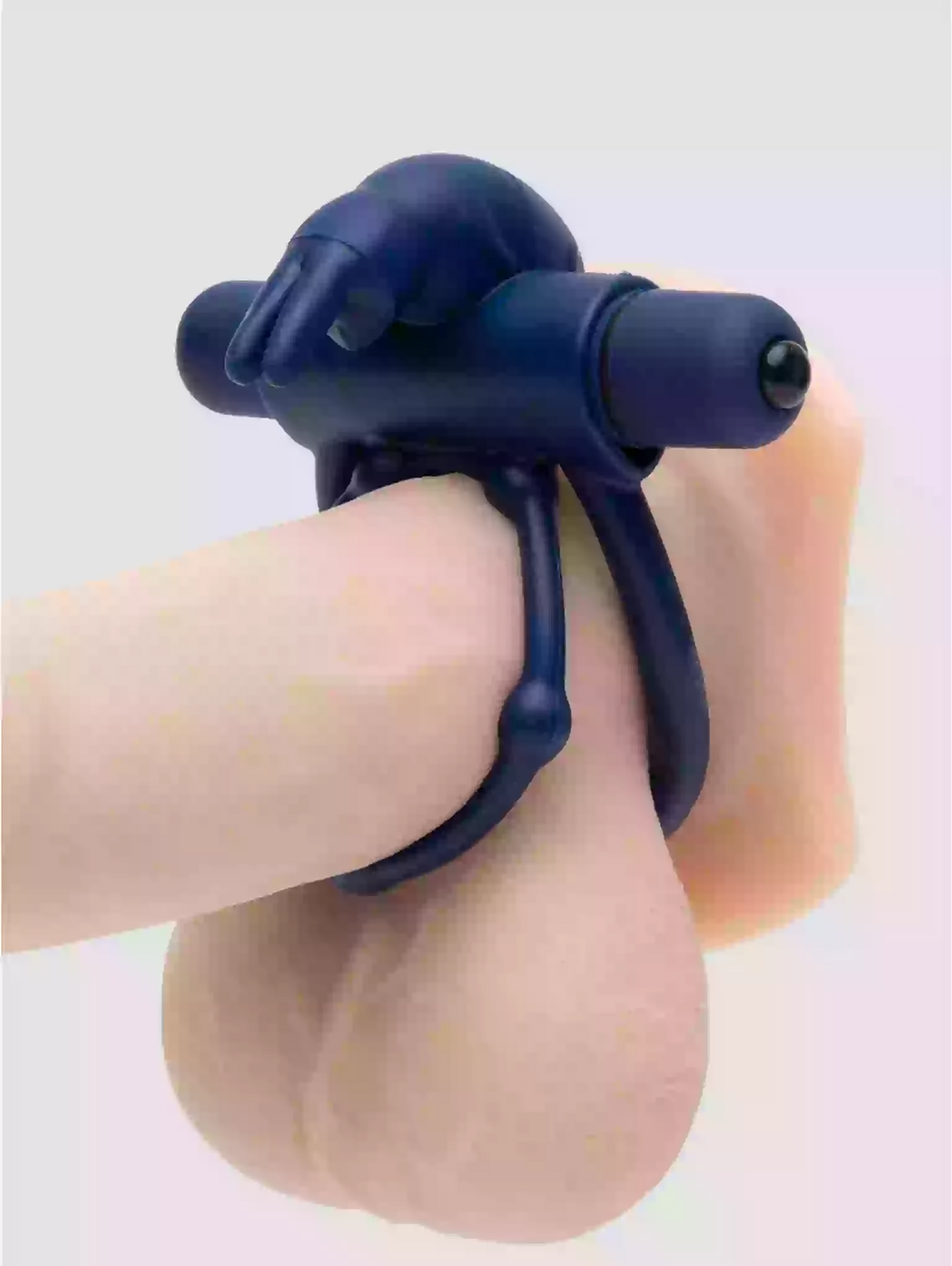 Navy blue ring with a unique design on a light gray background