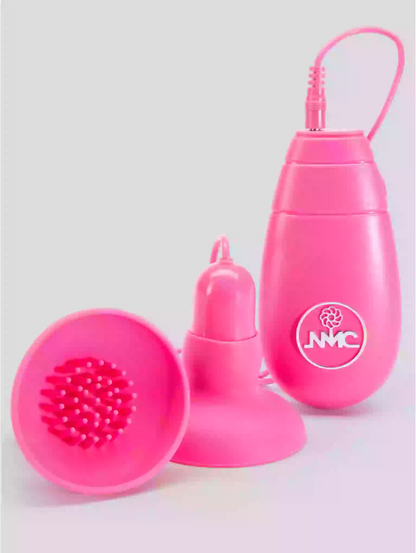 Pink grooming tool set with a brush and container on a light gray background