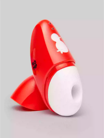 Red and white dog toy with a small black logo on a gray background