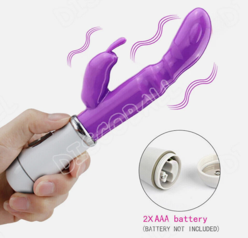 Purple and white device held by a hand with battery information on a white background