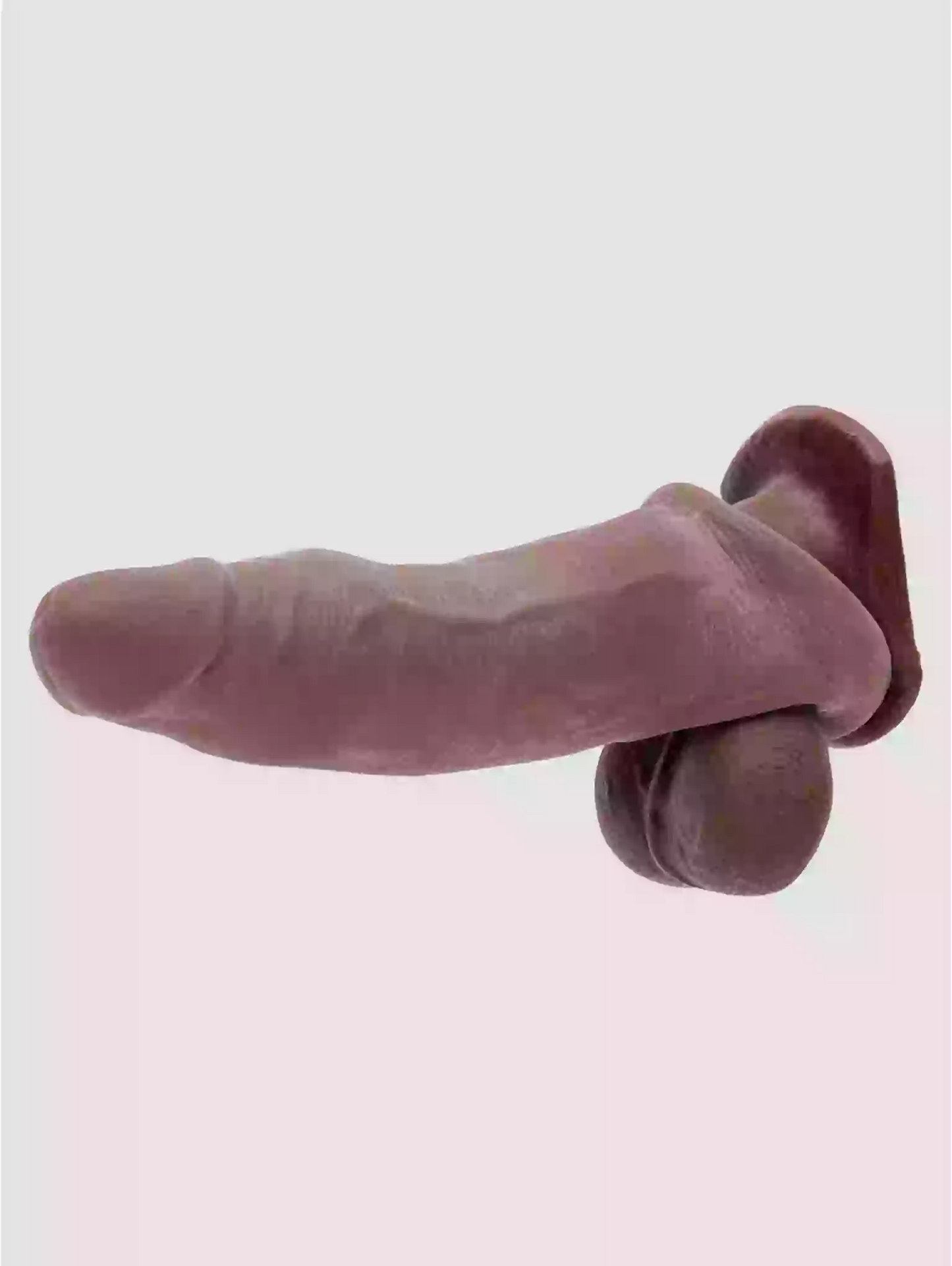Pair of pink socks on a light gray background