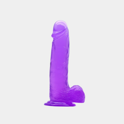 Purple silicone butt plug on a white background