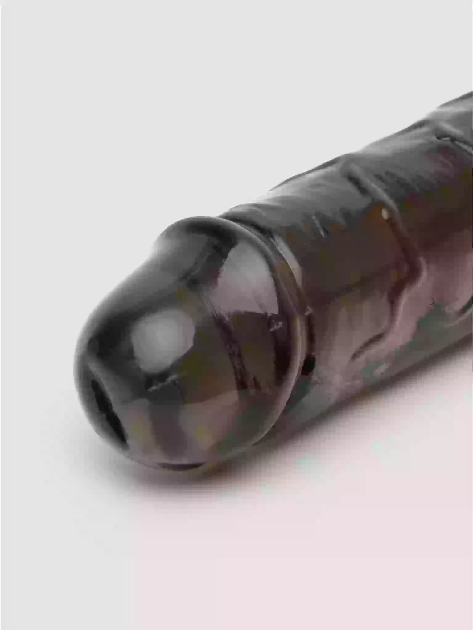 Camouflage-patterned water bottle on a light gray background