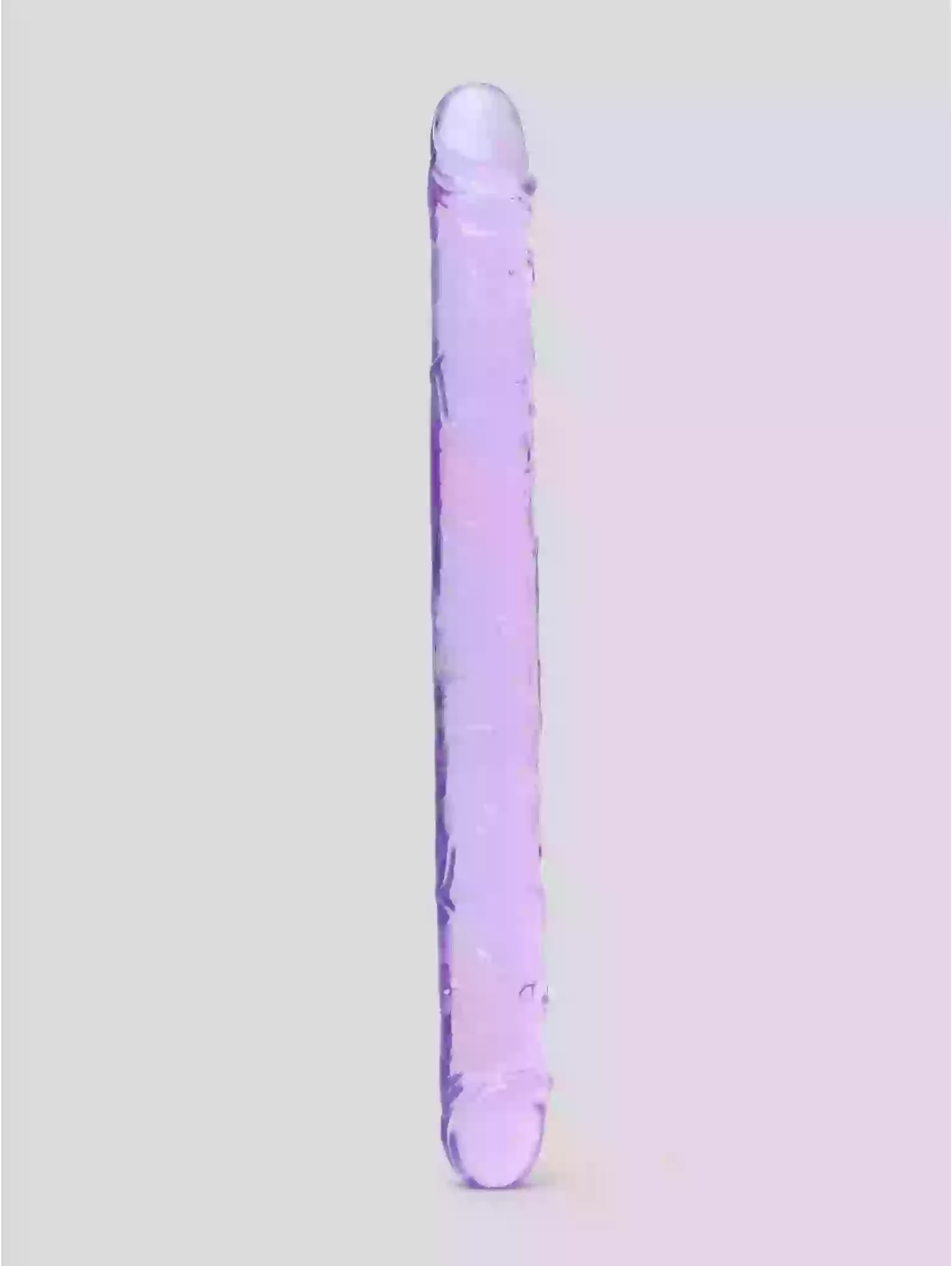Gradient purple and pink cylindrical object on a light gray background