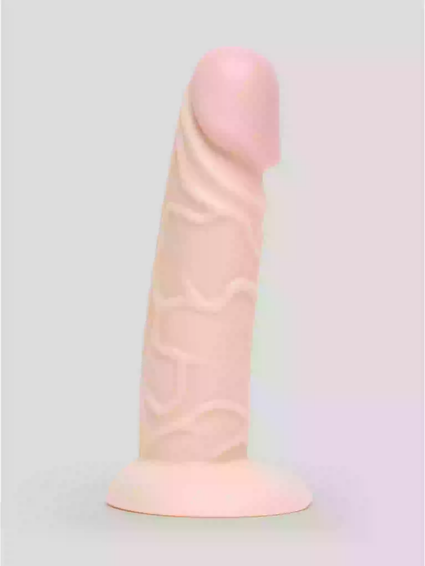 Pink silicone product on a light gray background