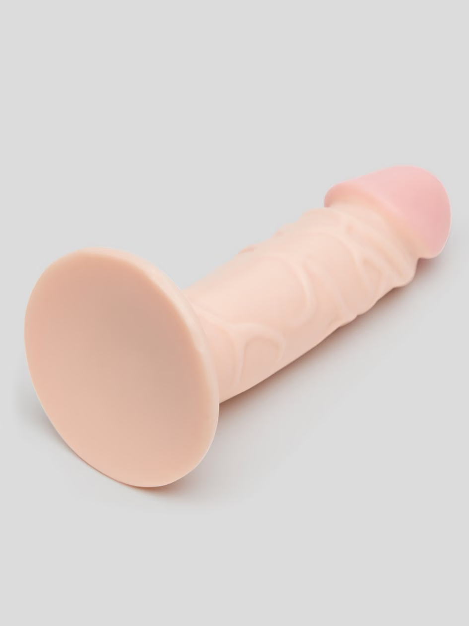Pink silicone product on a light gray background