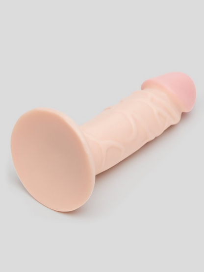 Pink silicone product on a light gray background