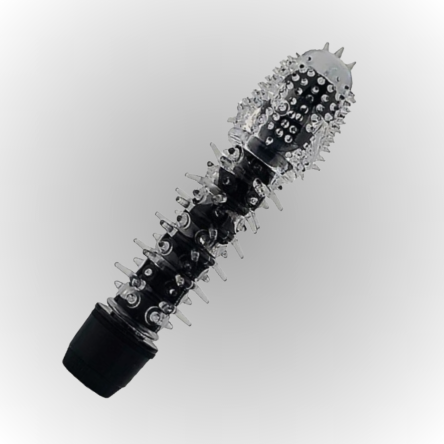 Black and clear spiked cylindrical object on a white background