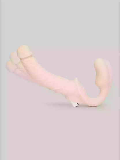 Pink and beige plush toy on a light gray background