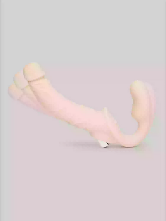 Pink and beige plush toy on a light gray background