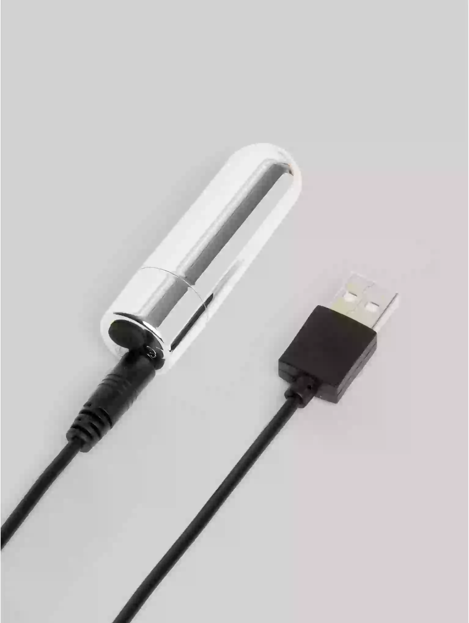 Silver USB light on a gray background