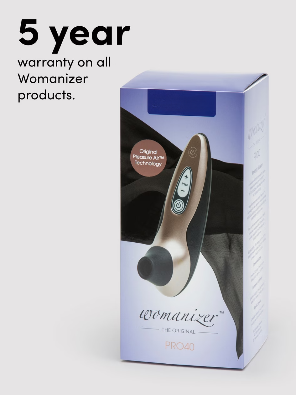Womanizer product packaging with warranty information on a white background