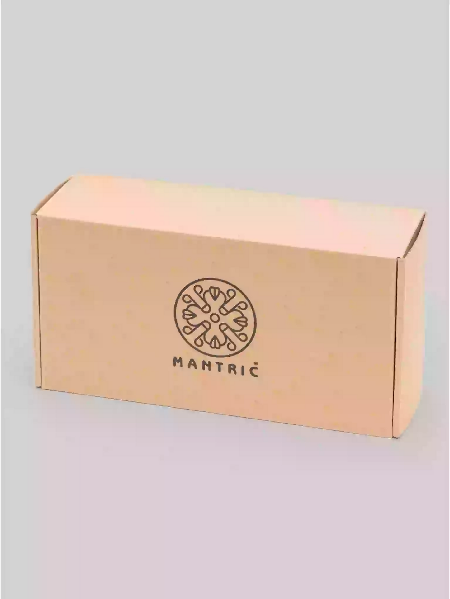 Mantric branded box on a gray background