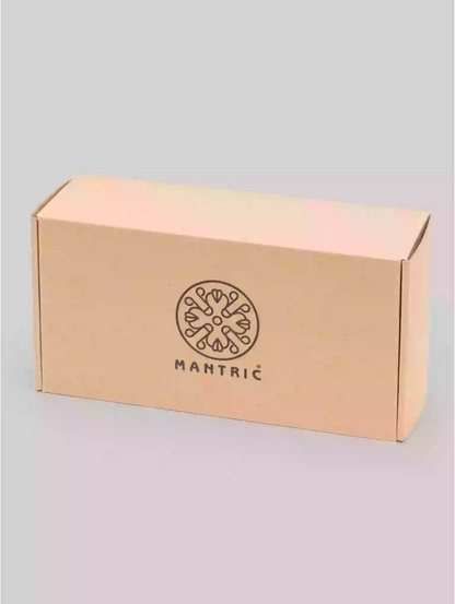 Mantric branded box on a gray background