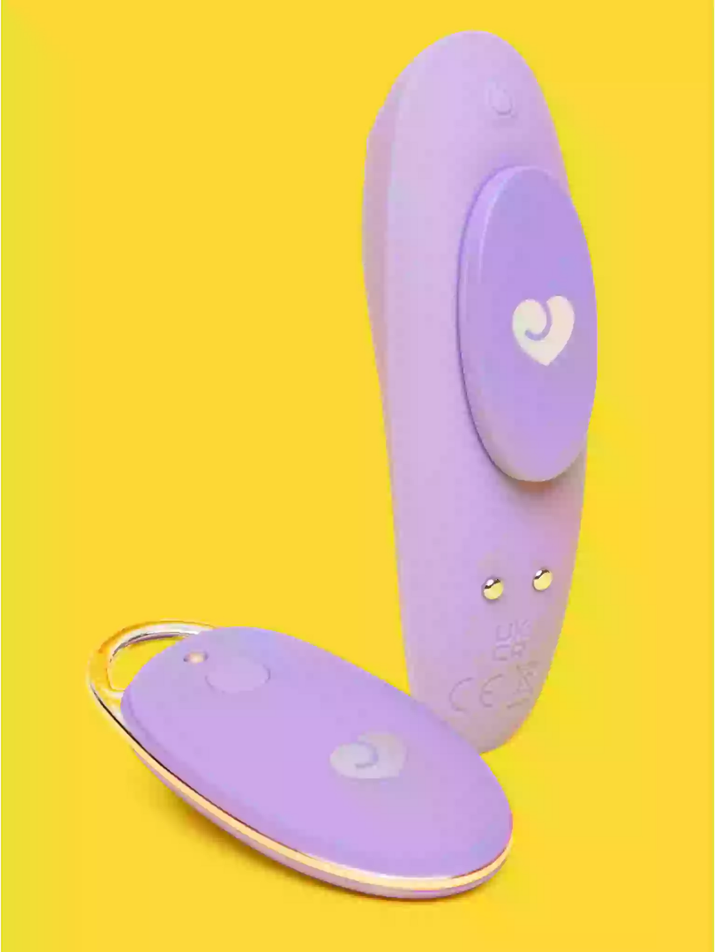 Purple electronic device with a heart symbol on a yellow background