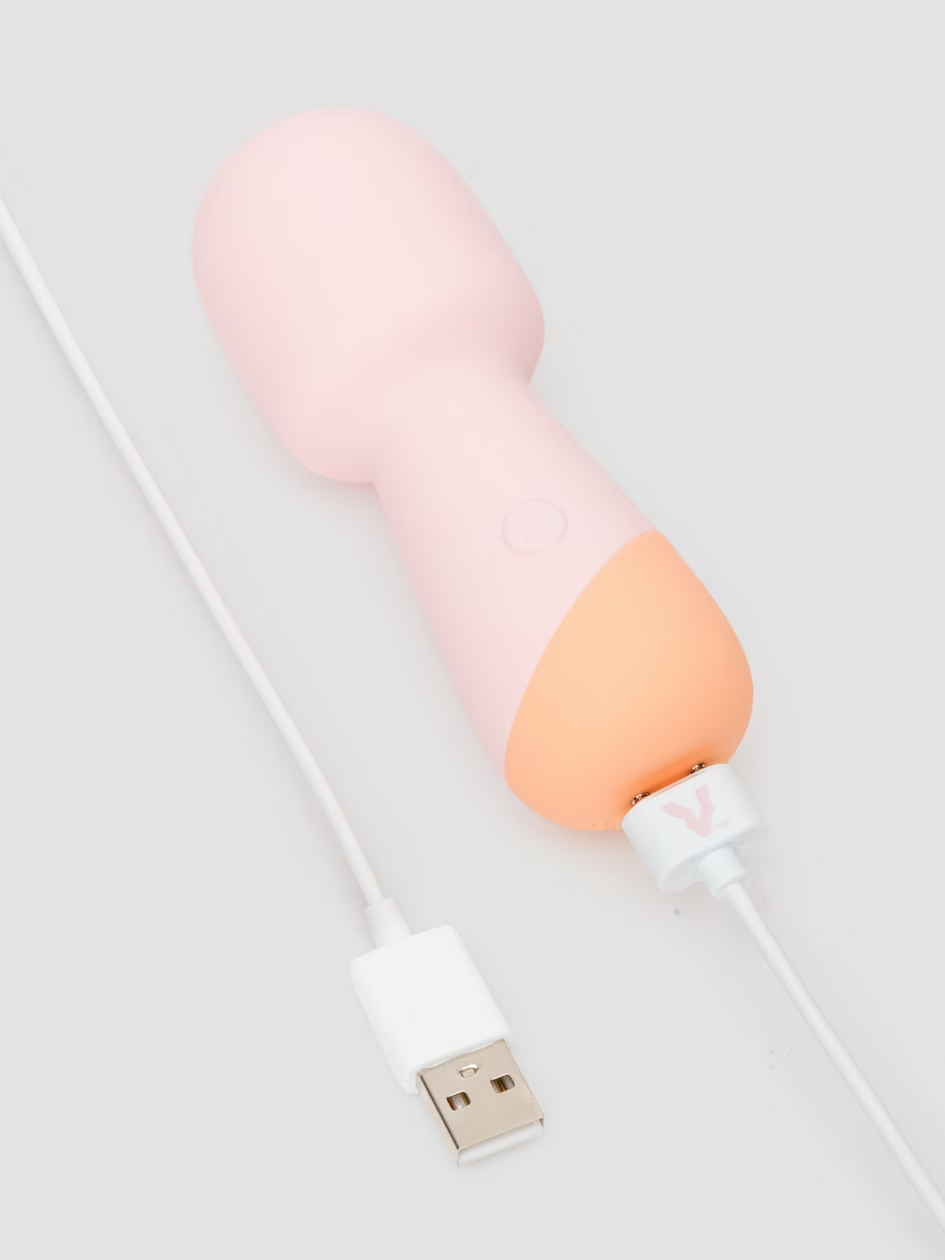Pink and orange USB cable on a white background