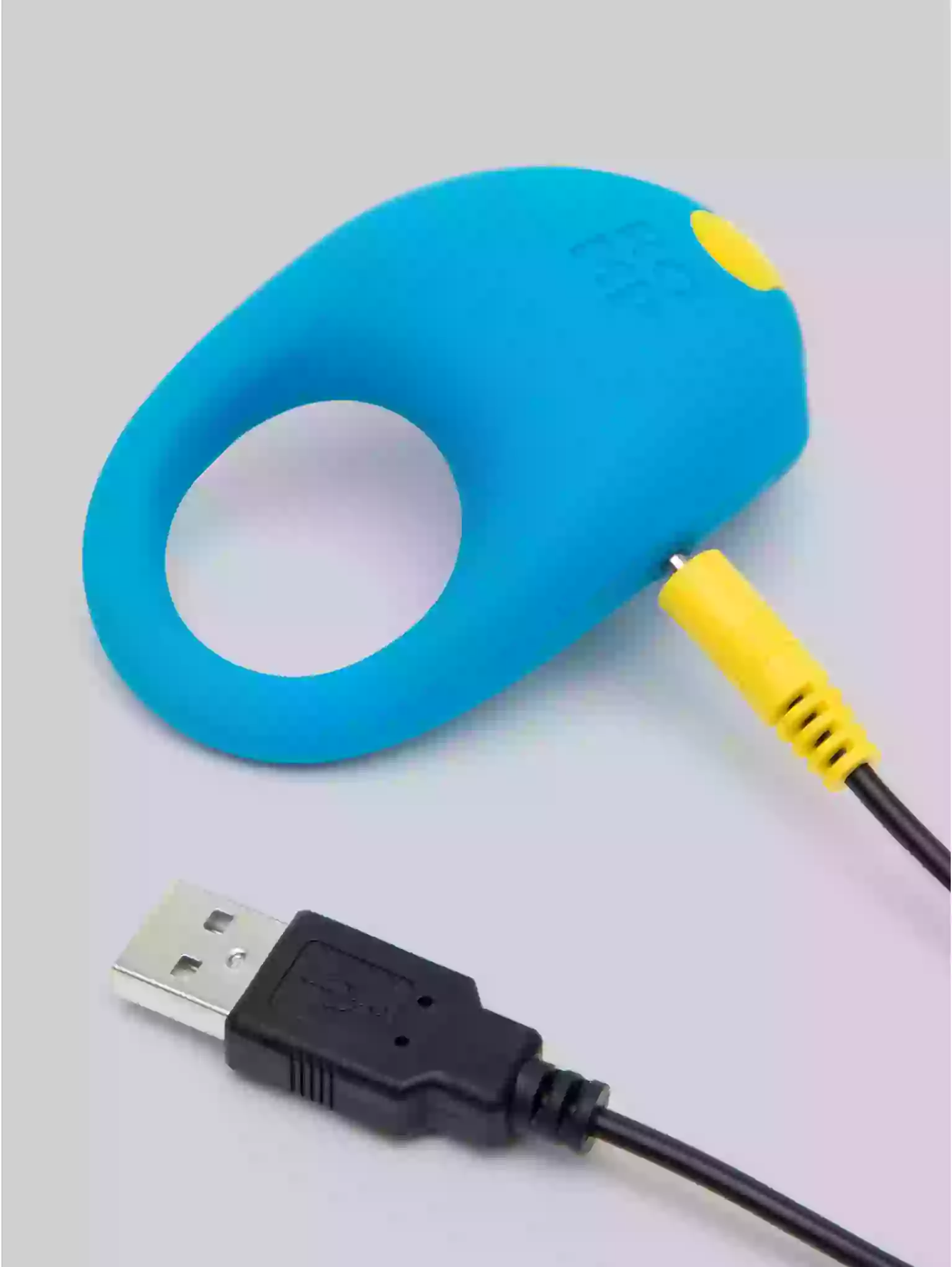 Blue silicone case with yellow connector and USB cable on a light gray background