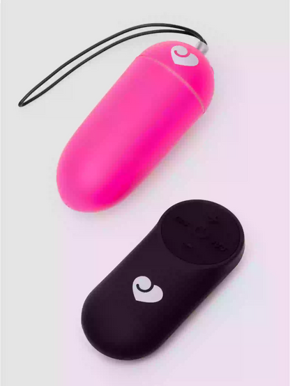 Pink and black silicone case with heart logo on a light gray background