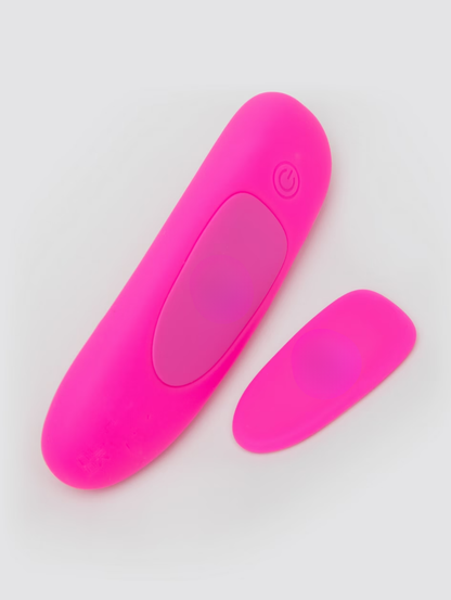 Two pink silicone devices on a light gray background
