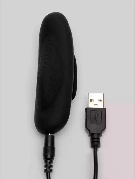 Black electronic device with USB connector on a gray background