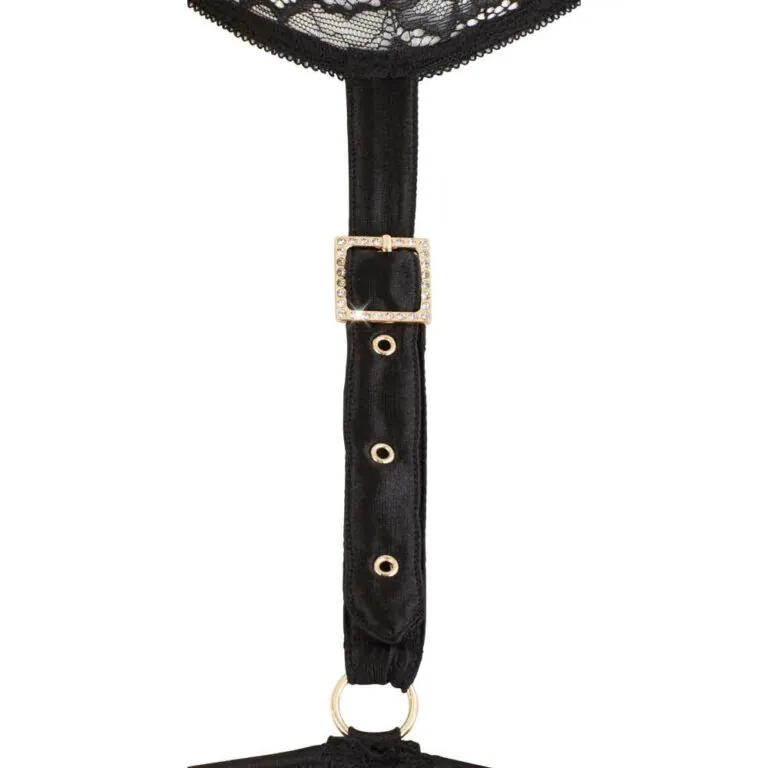 Black lace lingerie set with a strap and gold buckle on a white background