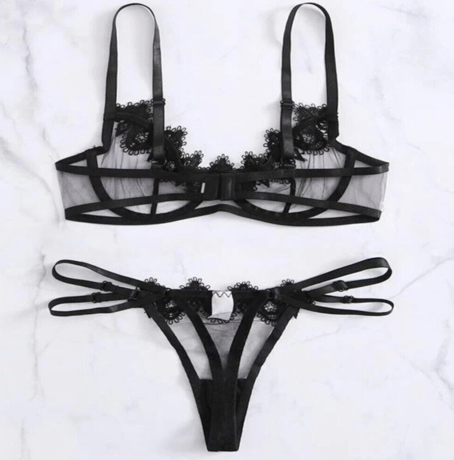 Black lace lingerie set on a white background