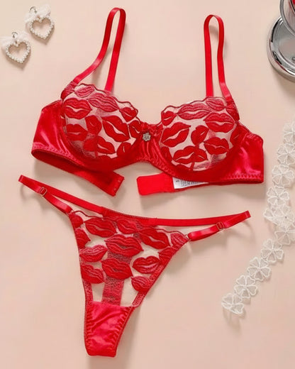 Red lingerie set with floral patterns on a beige background