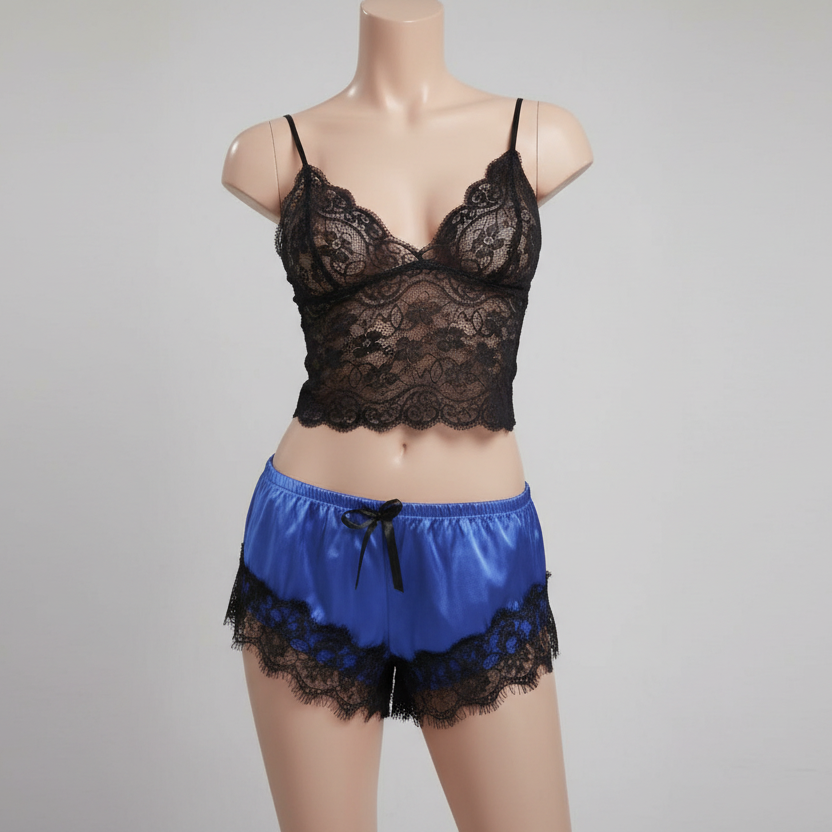Black lace bra and blue satin shorts on a mannequin against a gray background
