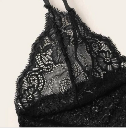 Black lace lingerie set on a light background