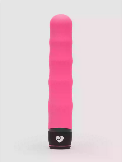 Pink and black device with a heart logo on a light gray background