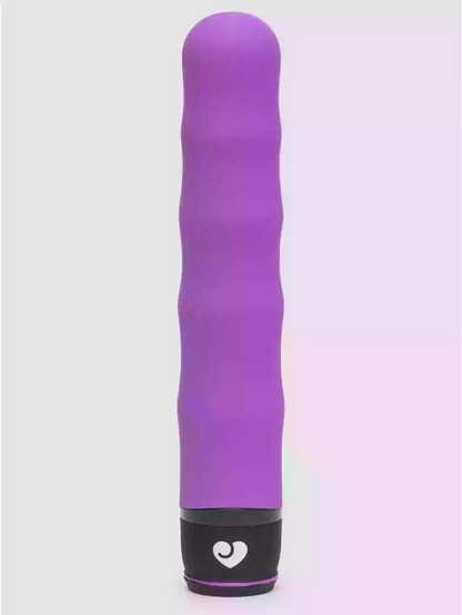 Purple cylindrical object with a black base on a white background