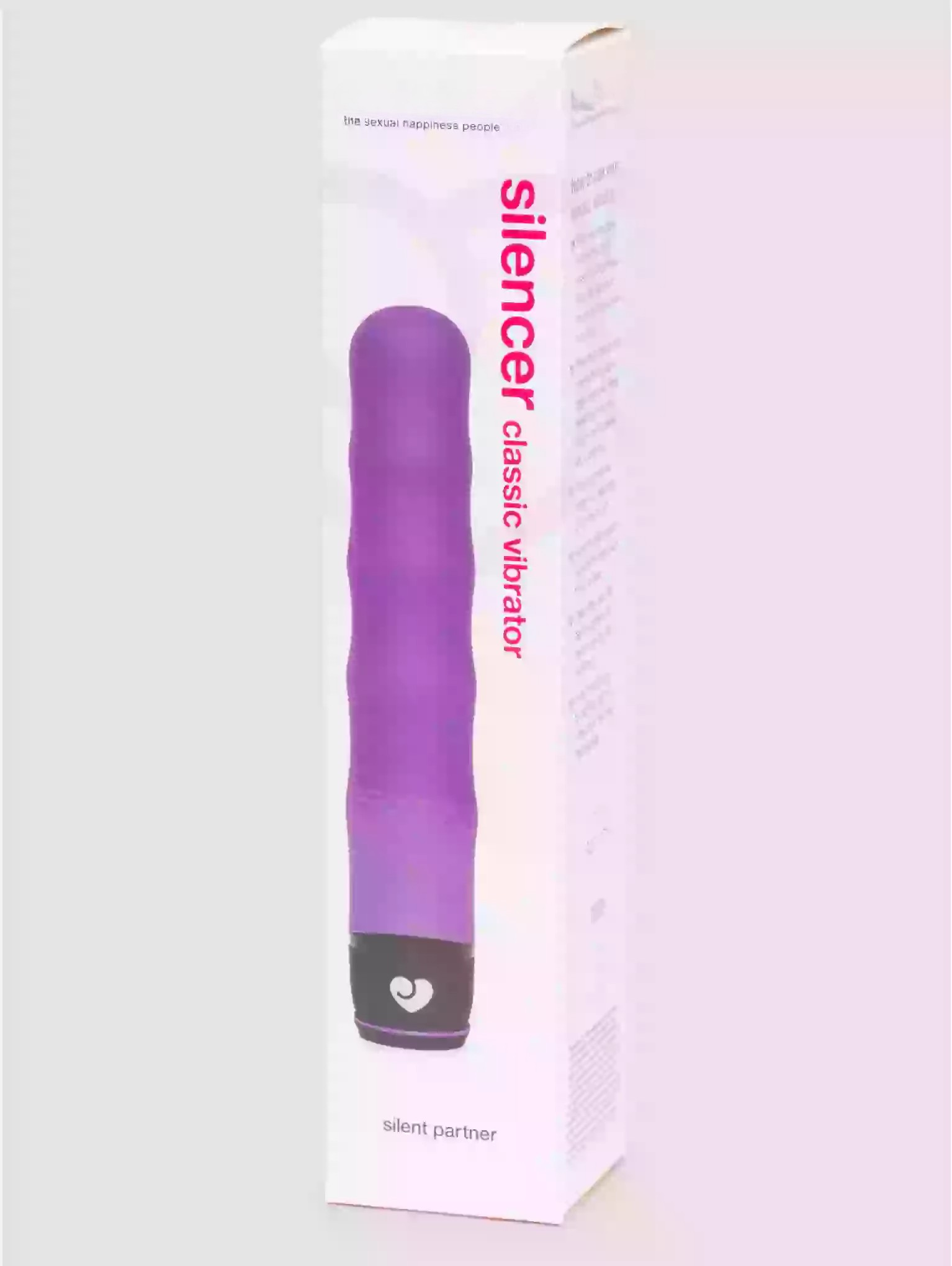 Purple vibrator with packaging on a white background