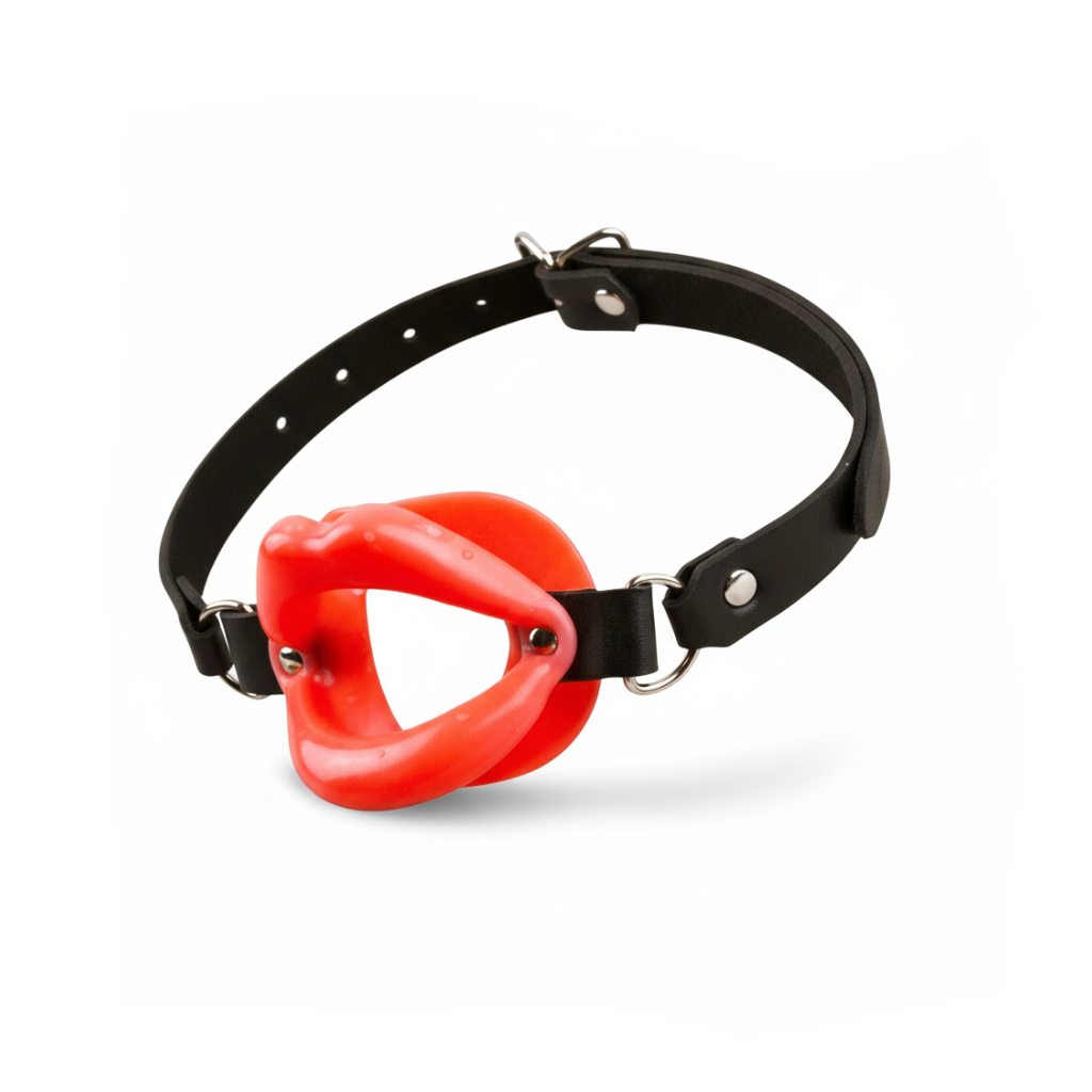Black leather collar with a red plastic dog muzzle on a white background