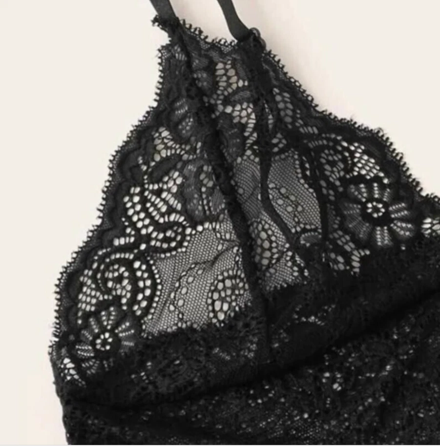 Black lace lingerie set on a light background