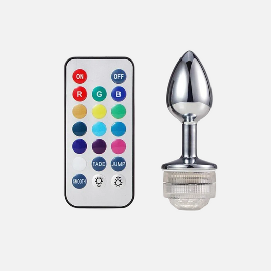 Chromed butt plug with remote control on a white background