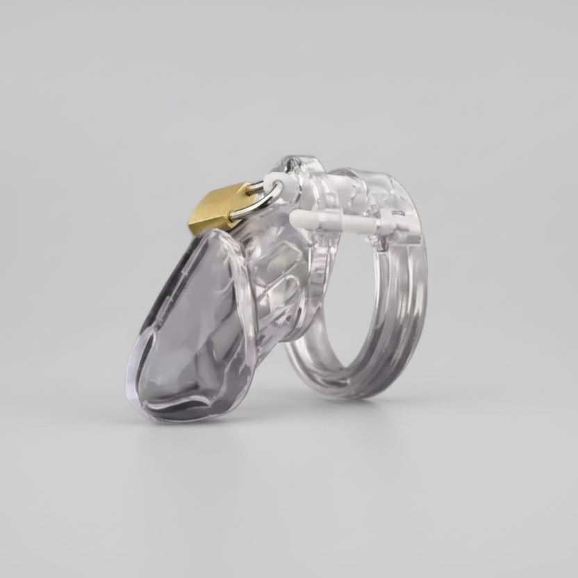 Clear plastic handcuffs with a gold lock on a gray background