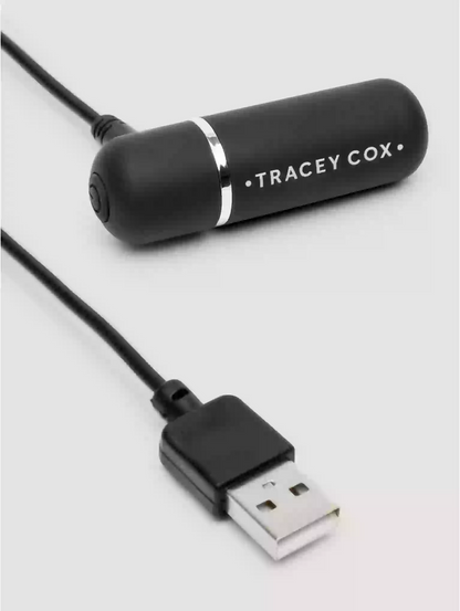 Black USB device with 'Tracey Cox' branding on a light gray background