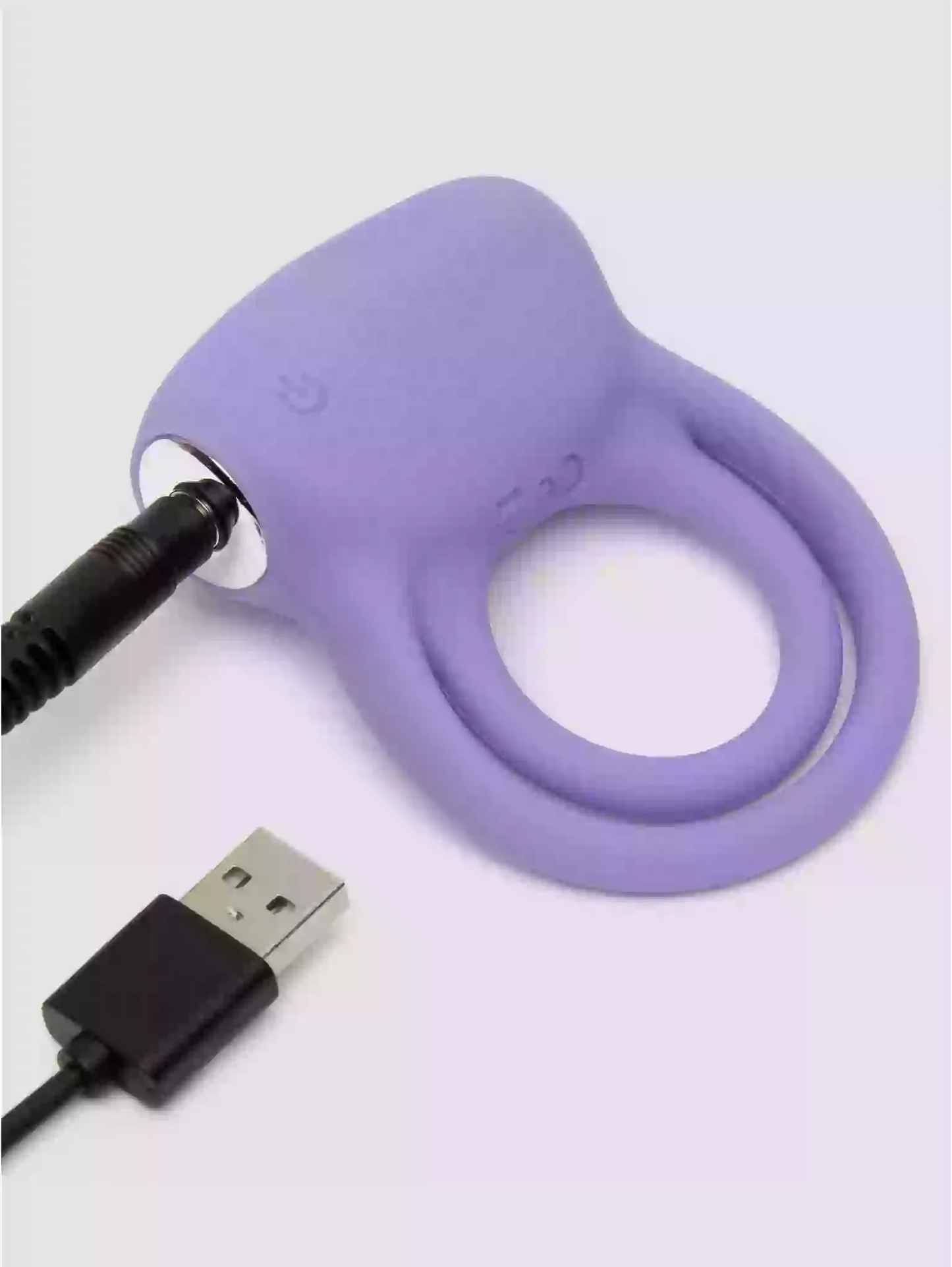 Purple silicone ring with USB cable on a white background