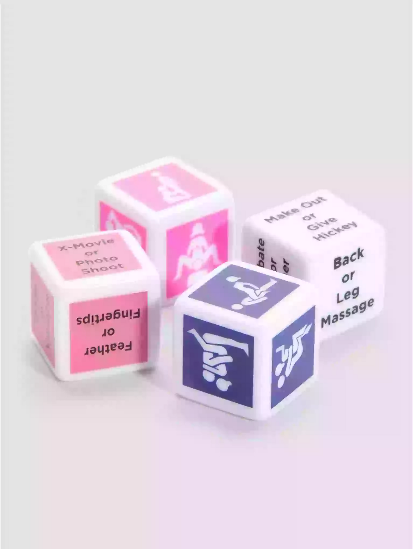 Four dice with various symbols and text on a light gray background