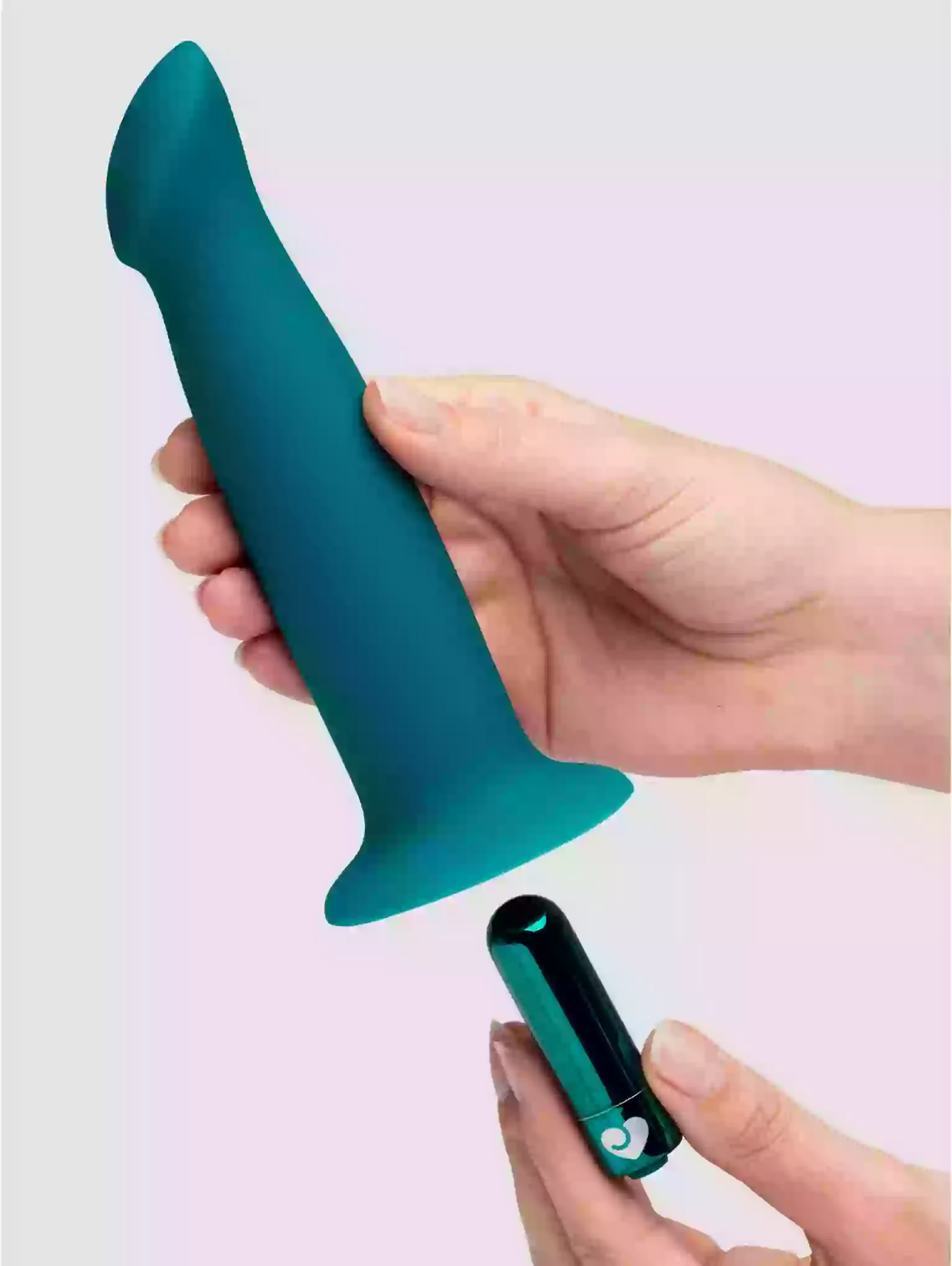Teal silicone sleeve being attached to a black device by a hand on a gradient background