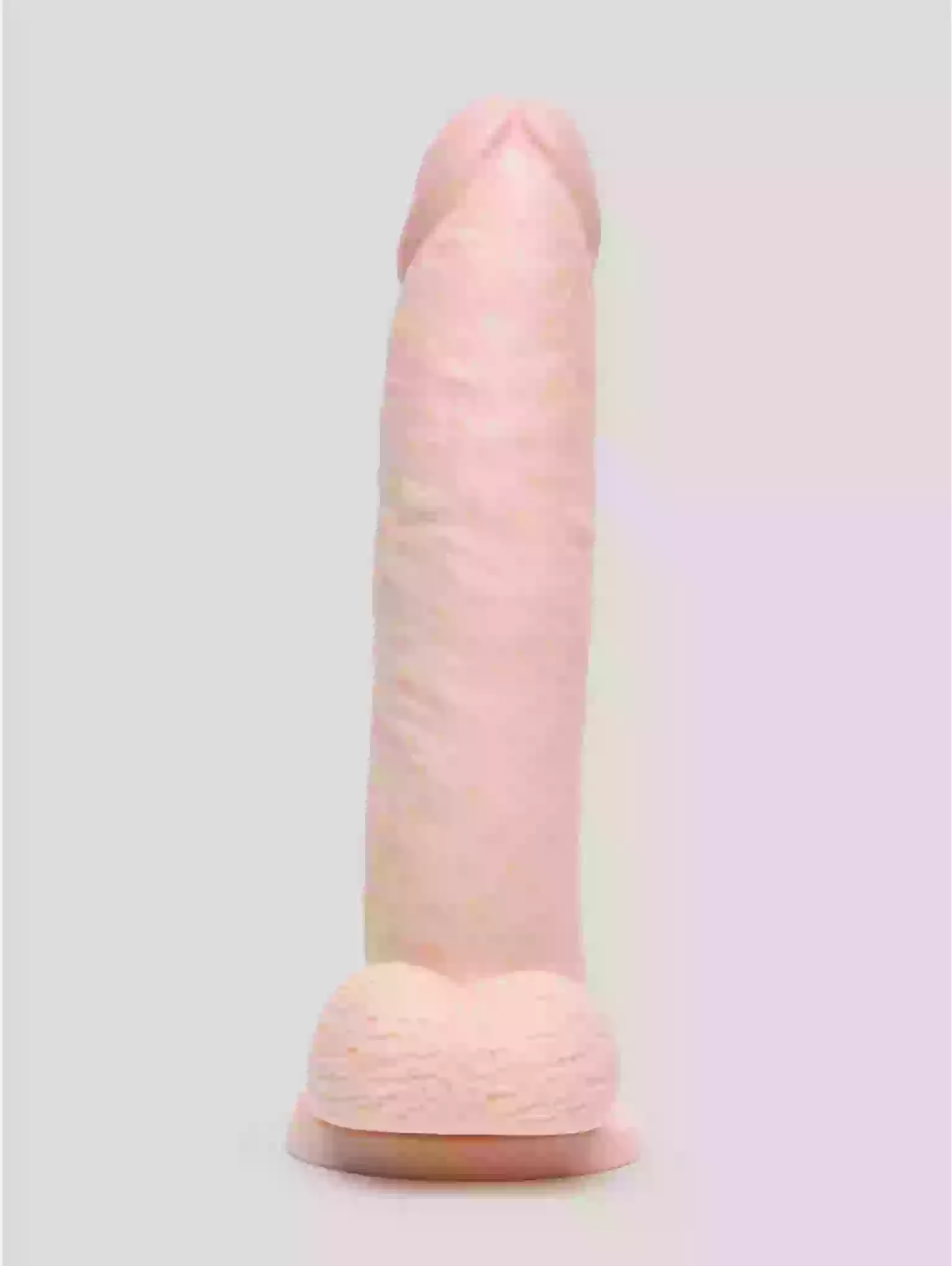 Pink and beige cylindrical object on a gradient background