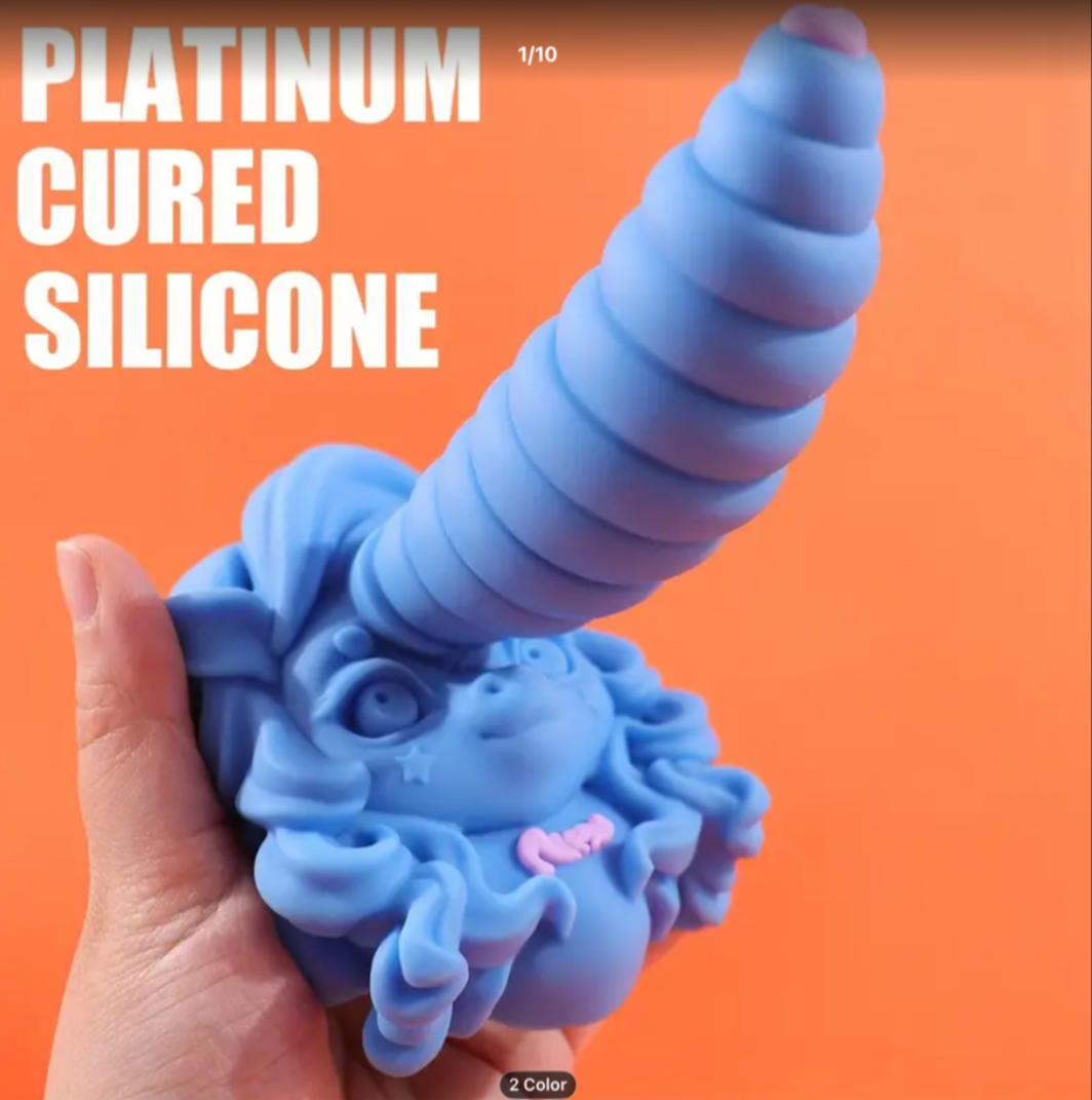 Blue silicone product held by a hand with 'Platinum Cured Silicone' text on an orange background