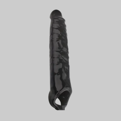 Black textured object on a gray background