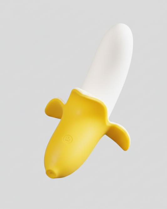 Yellow and white banana-shaped object on a light gray background