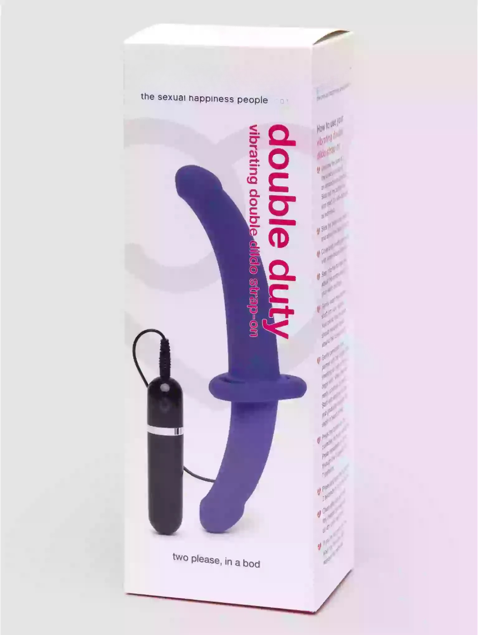 Purple and black double-duty vibrator with packaging on a white background