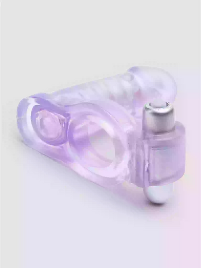 Purple and white marbled perfume bottle on a light gray background