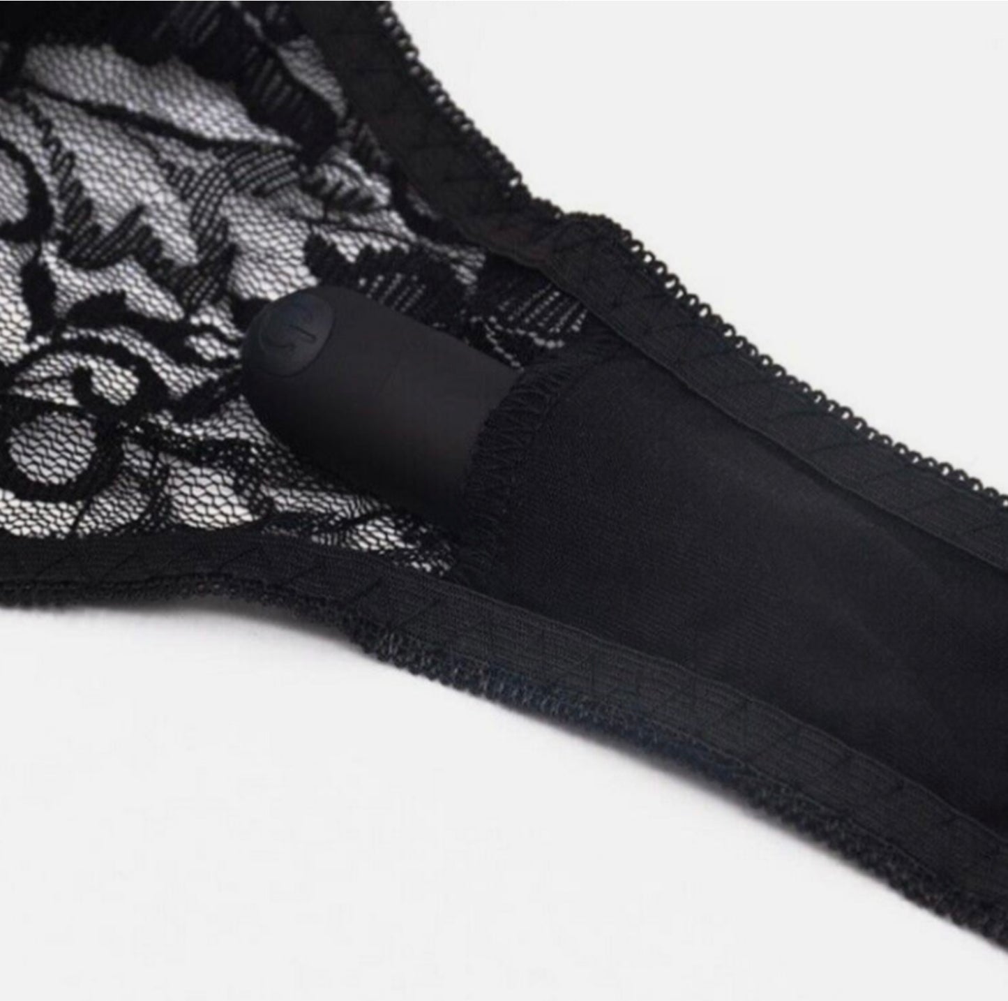 Black lace lingerie on a white background